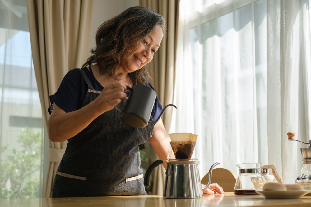 Woman pouring her morning coffee