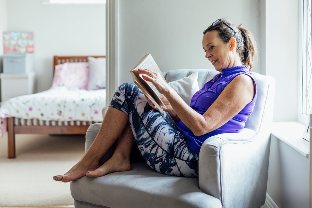 A woman reading a book.